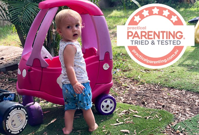 This pink Little Tikes Cozy Coupe at our local cafe was Louis' first introduction to the mean machine.