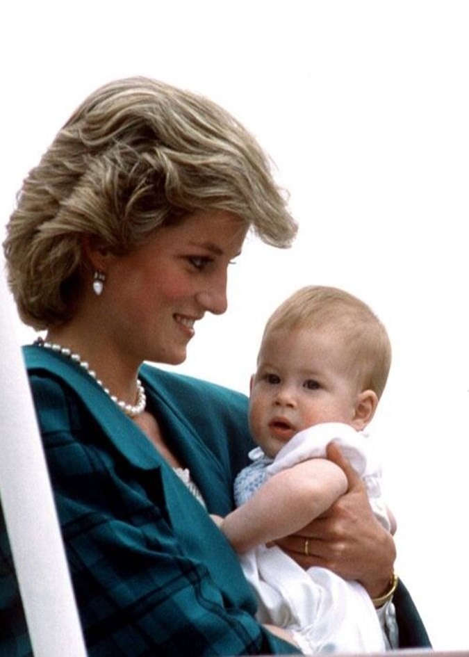 Prince Harry, at around eight months old, with Mum Princess Diana. Image: Getty
