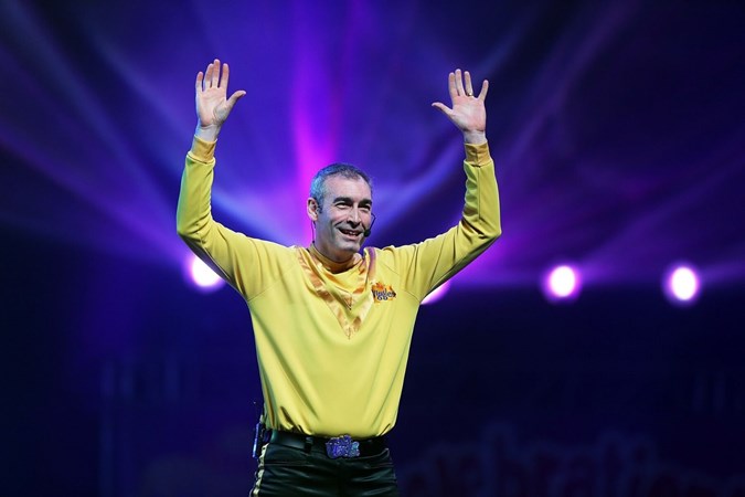 Greg performing as the Yellow Wiggle. Image: Getty