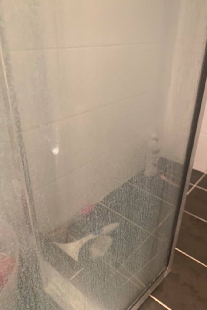 Tracey's shower before. Image: Mums Who Clean/Facebook